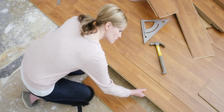 Accurate measuring tools are essential for DIY flooring installation